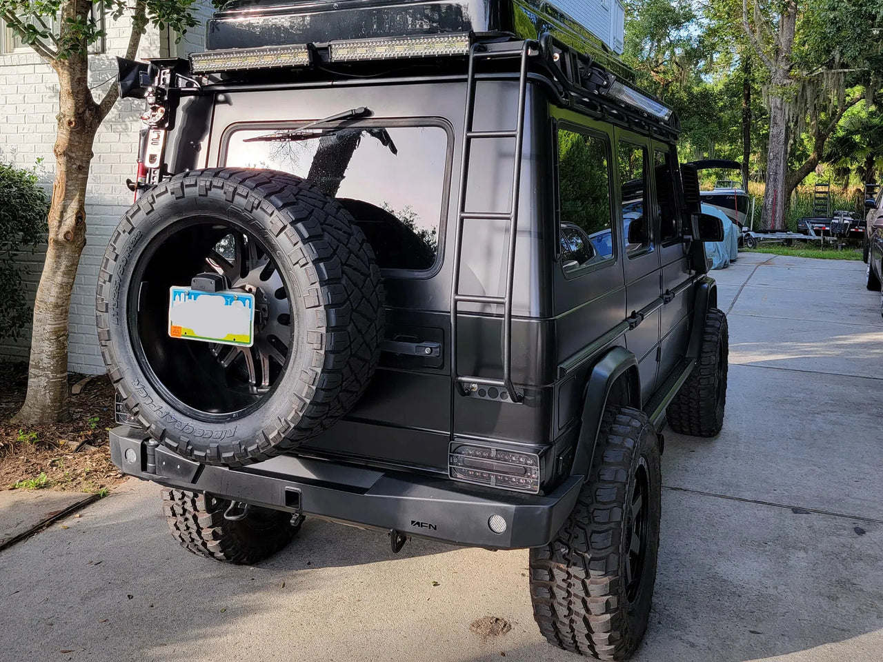 AFN 4x4 Accessories 48002556 | Rear bumper w/ wheel carrier | Mercedes G Wagen with rugged design